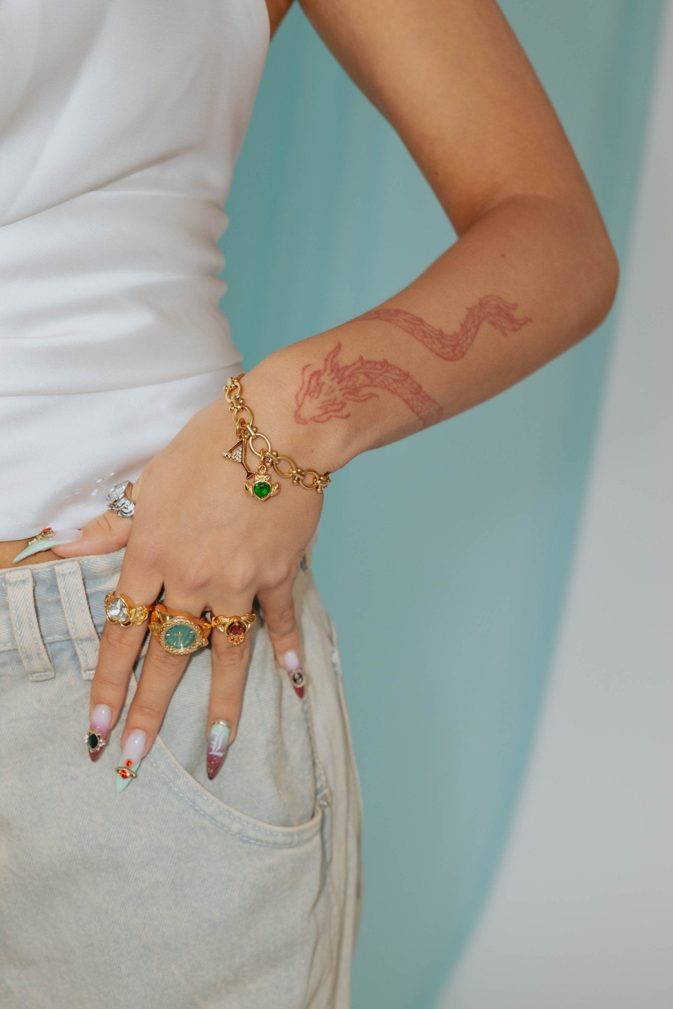 LAUREN X LYNOTT SINGLE OLTA CHARM best gold plated tarnish and water resistant piece by Irish Jewellery brand - Lynott Jewellery
