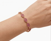 SANTORINI DARK PINK EVIL EYE BRACELET best gold plated tarnish and water resistant piece by Irish Jewellery brand - Lynott Jewellery