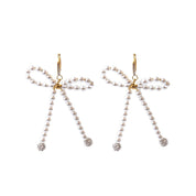 PEARL BOW EARRINGS best gold plated tarnish and water resistant piece by Irish Jewellery brand - Lynott Jewellery