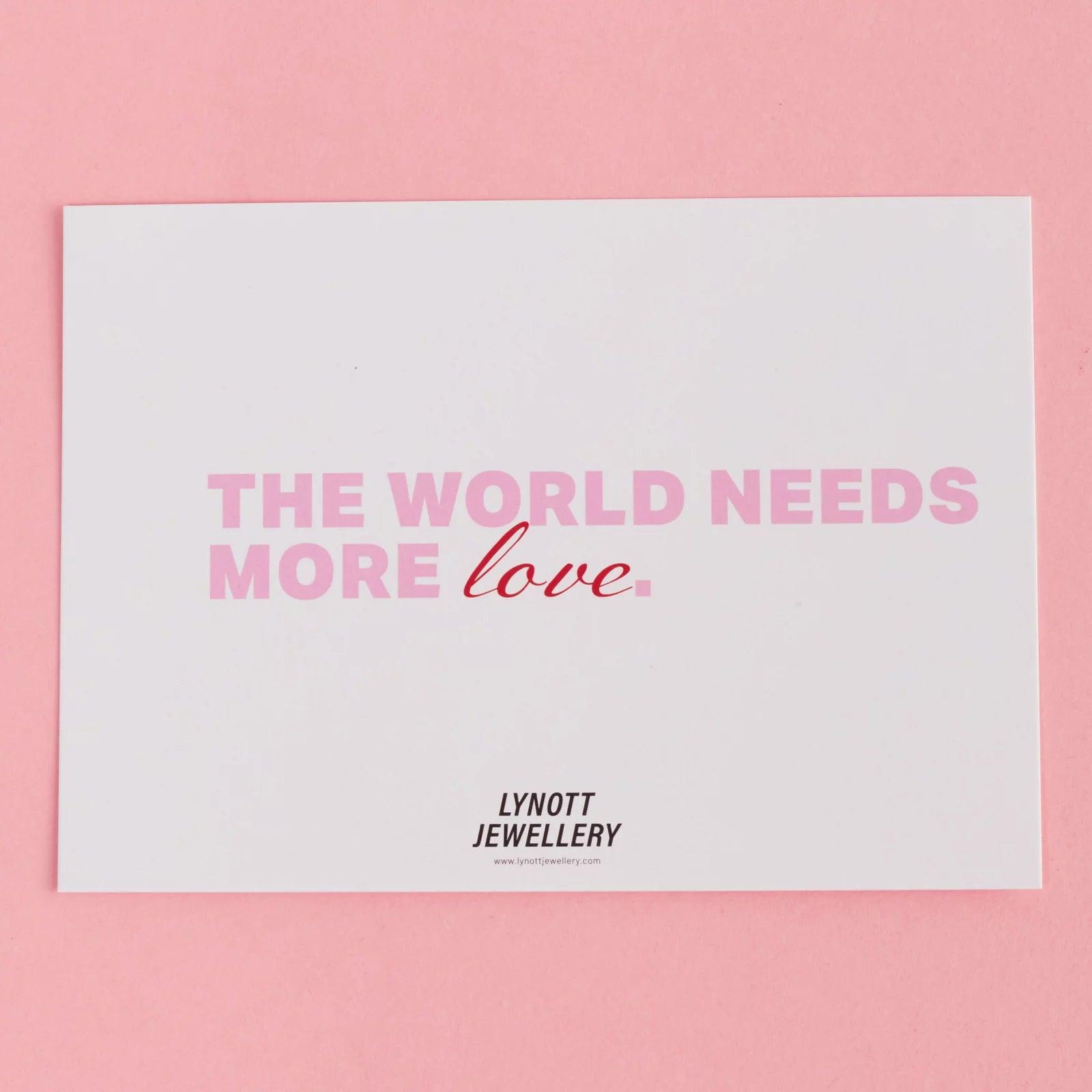 PERSONALISED WORLD NEEDS MORE LOVE CARD best gold plated tarnish and water resistant piece by Irish Jewellery brand - Lynott Jewellery